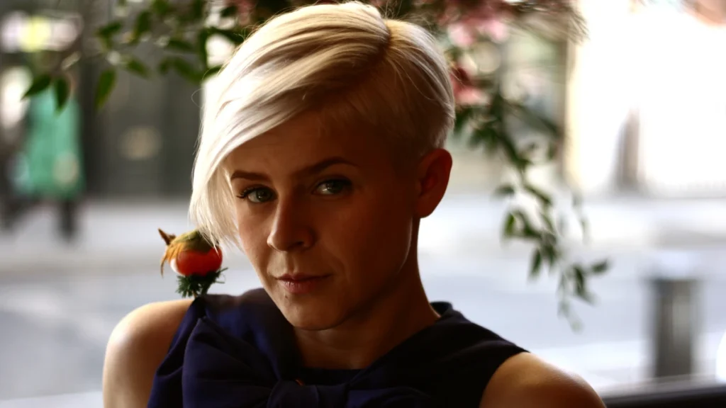 Portrait of Robyn in window light, looking at the camera