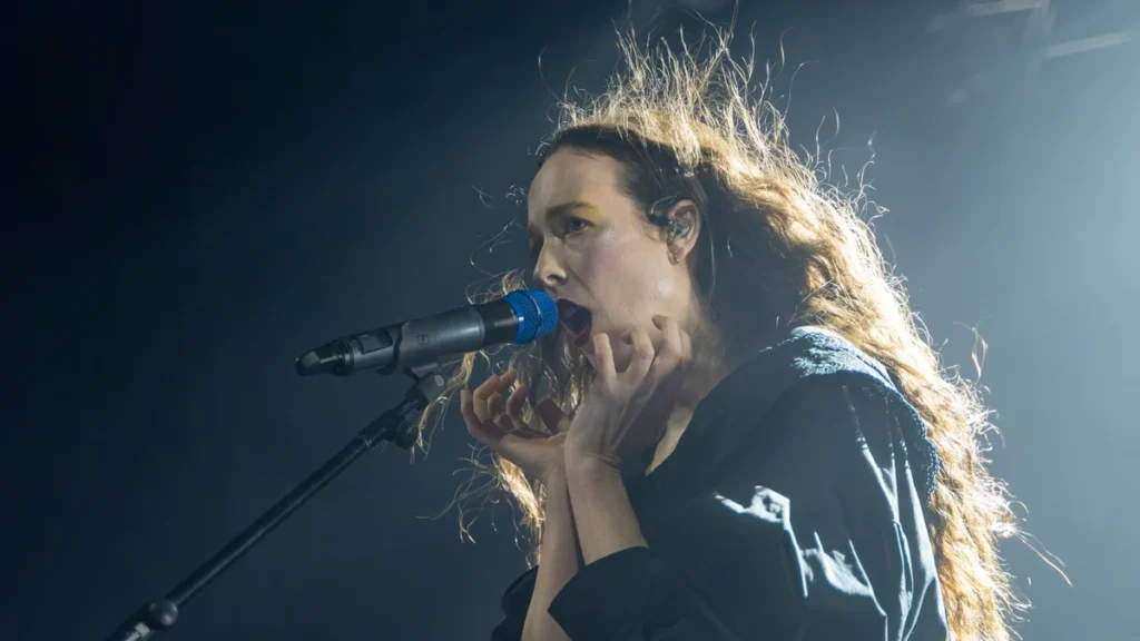 Allie X performing live on stage