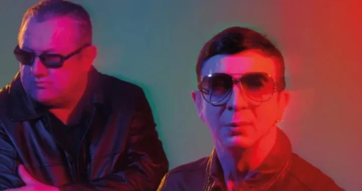 Dave Ball and Marc Almond of Soft Cell in red and green club lighting